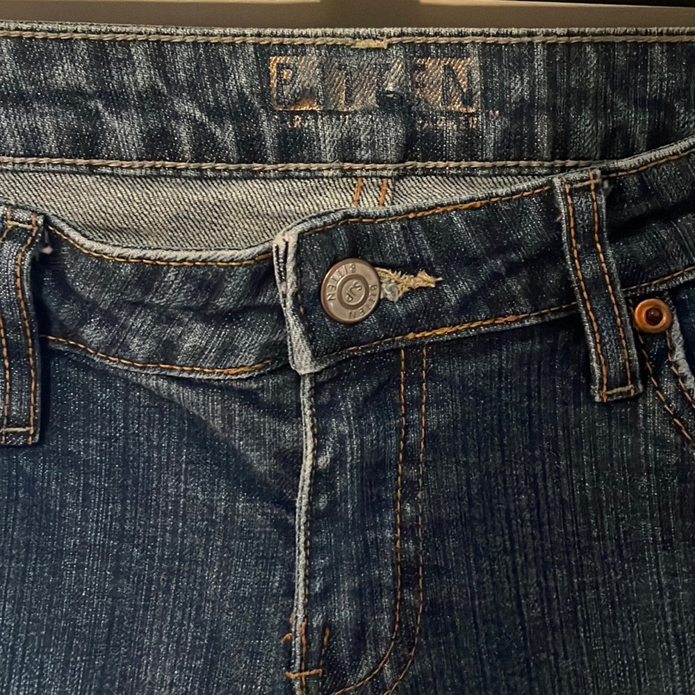 Bitten Sarah Jessica Parker dark wash jeans.
